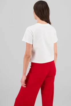 Playera manga corta detalle moños perlas