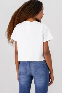 Playera manga corta detalle moños perlas