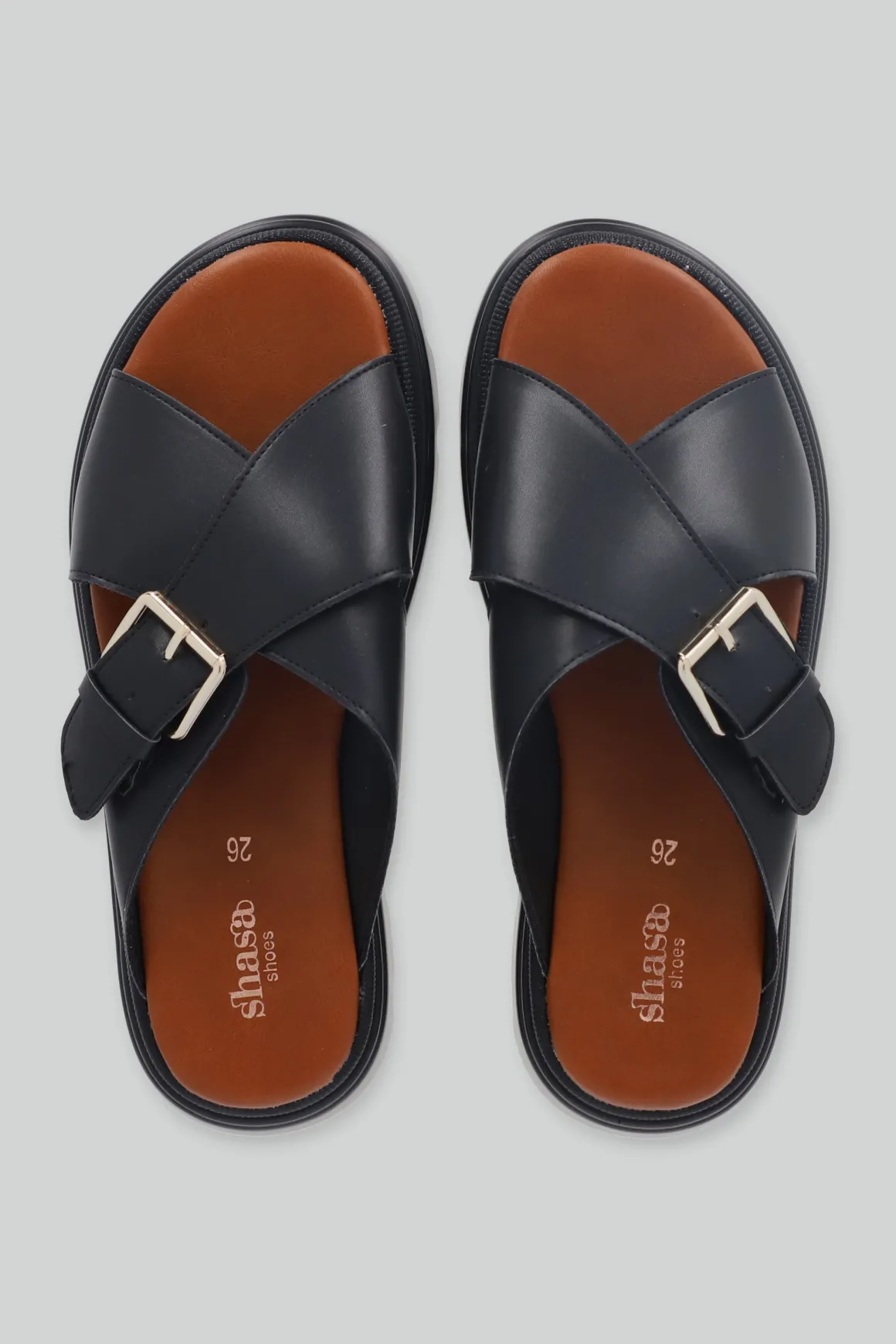 Sandalia suela dentada tiras cruzadas hebilla