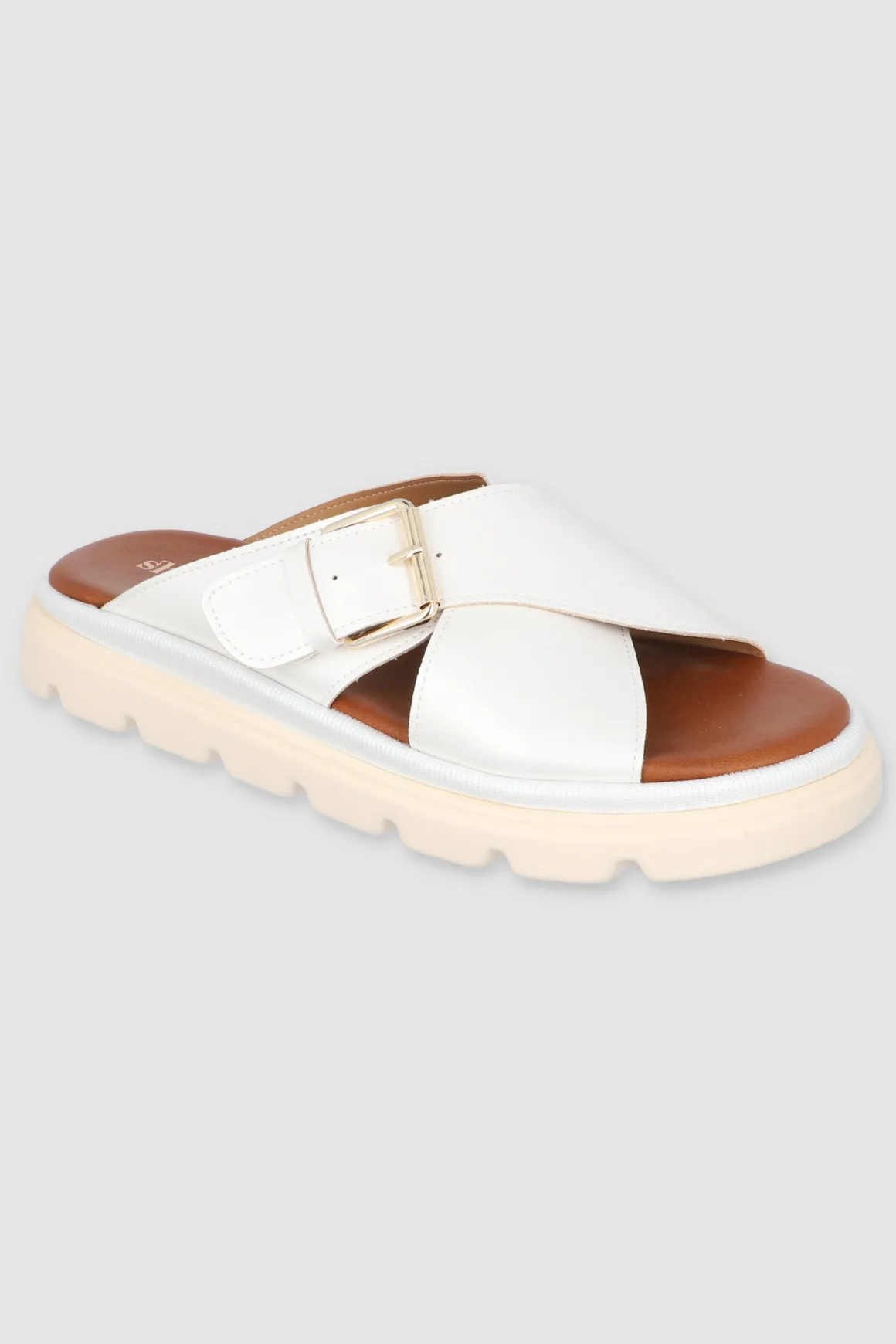 Sandalia suela dentada tiras cruzadas hebilla