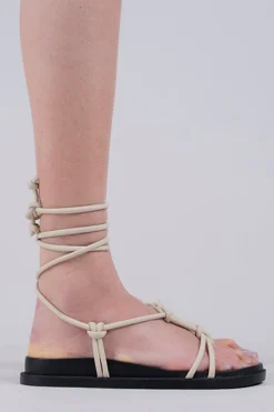 Sandalias planas lace up nudos