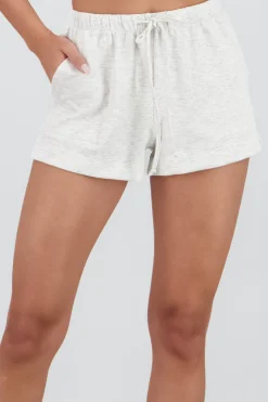 Short corto con bolsas