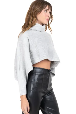 Suéter crop abierto cuello alto