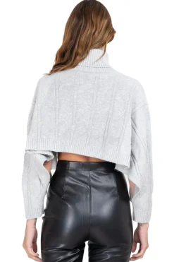 Suéter crop abierto cuello alto