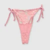 Tanga con moños y encaje
