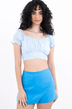 Top crop manga abullonada olanes