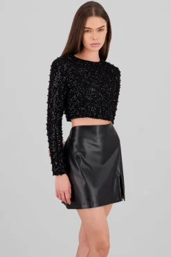 Top manga larga crop lentejuela detalle aplicacion