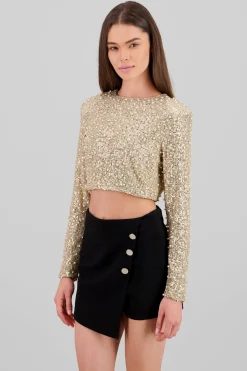 Top manga larga crop lentejuela detalle aplicacion