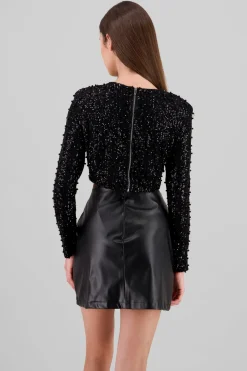 Top manga larga crop lentejuela detalle aplicacion