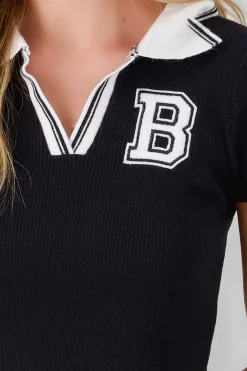 Top tejido polo detalle parche