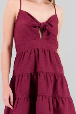 Vestido mini detalle moños olanes