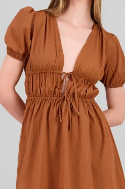 Vestido mini detalle moños