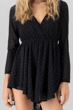 Vestido mini manga larga brillos