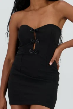 Vestido mini strapless detalle moños