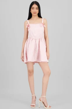 Vestido textura con moños