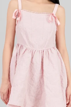 Vestido textura con moños